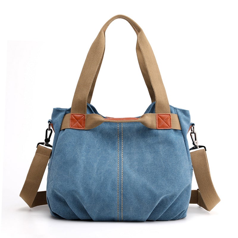 Large Capacity Simple Solid Color Multifunctional Canvas Bag in various colors, showcasing its spacious design and durable fabric.