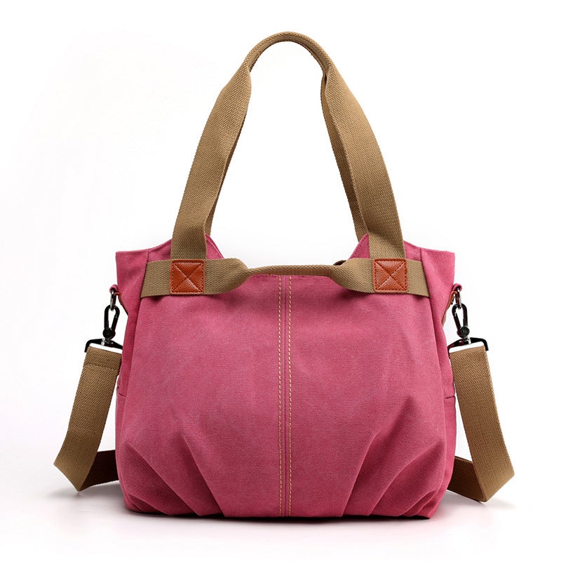 Large Capacity Simple Solid Color Multifunctional Canvas Bag in various colors, showcasing its spacious design and durable fabric.