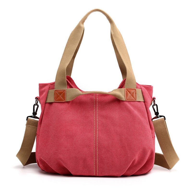 Large Capacity Simple Solid Color Multifunctional Canvas Bag in various colors, showcasing its spacious design and durable fabric.