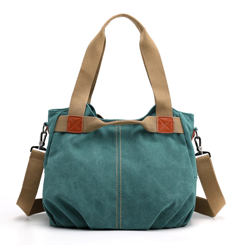 Large Capacity Simple Solid Color Multifunctional Canvas Bag in various colors, showcasing its spacious design and durable fabric.