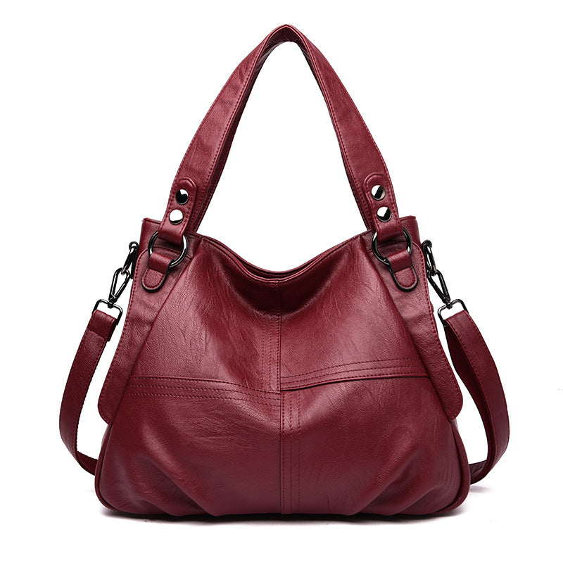 Large Capacity Single Shoulder Women's Messenger Bag made of two-layer cowhide leather, featuring a trendy square shape and zipper closure.