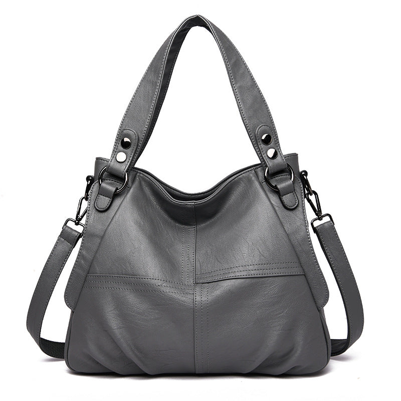 Large Capacity Single Shoulder Women's Messenger Bag made of two-layer cowhide leather, featuring a trendy square shape and zipper closure.