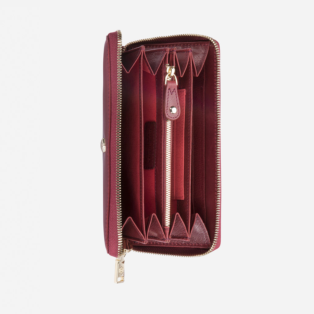 Large Classic Zip Around Purse in vibrant red with three compartments, showcasing its stylish design and functionality.