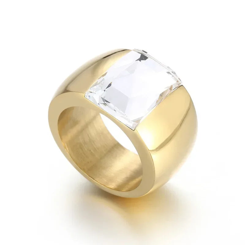 A large crystal stone ring made of stainless steel with a round Austrian crystal centerpiece, showcasing a trendy design for women.