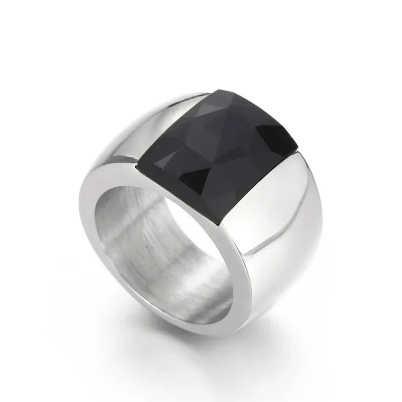 A large crystal stone ring made of stainless steel with a round Austrian crystal centerpiece, showcasing a trendy design for women.