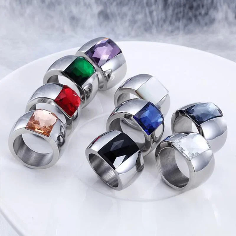 A large crystal stone ring made of stainless steel with a round Austrian crystal centerpiece, showcasing a trendy design for women.