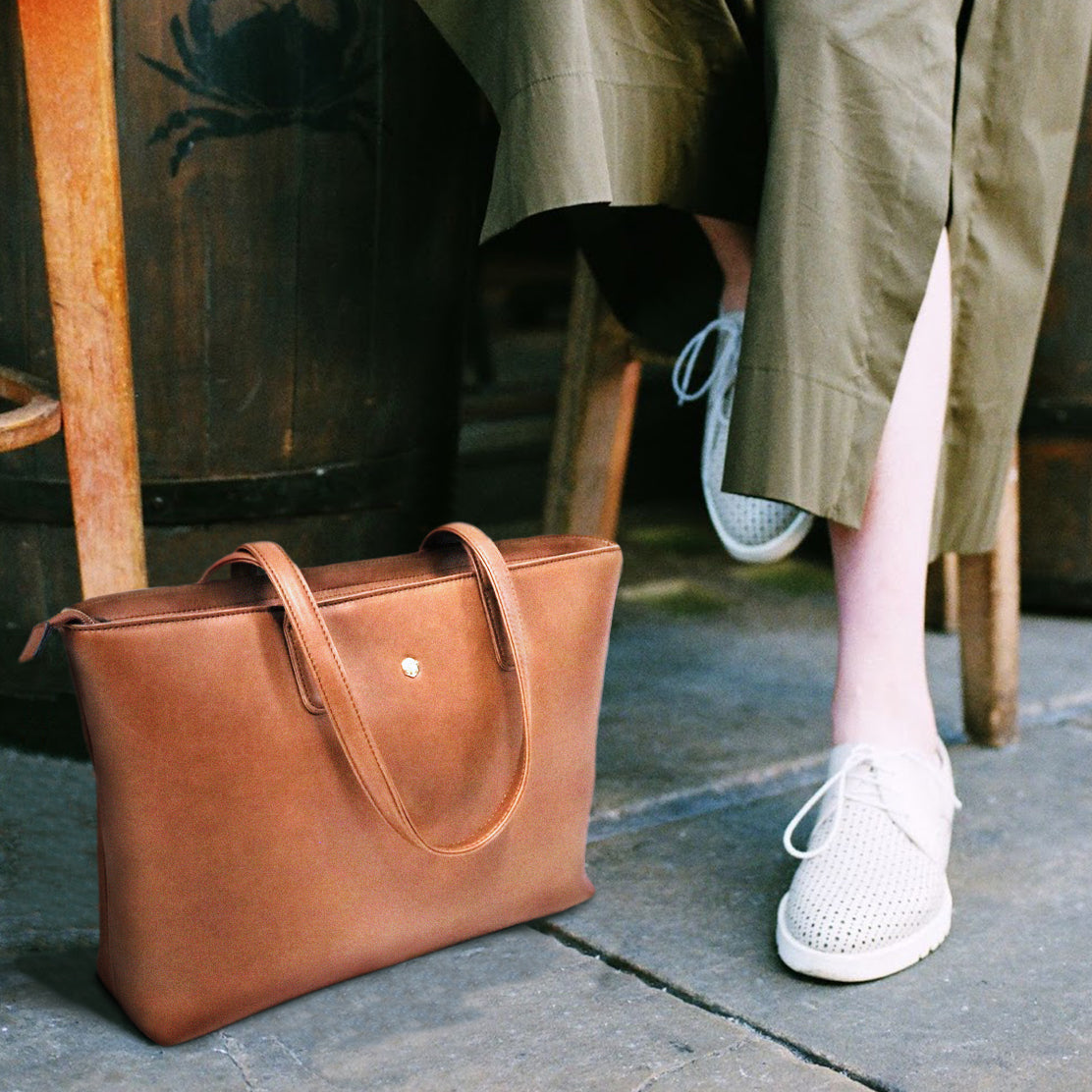 Large Ladies Laptop Shopper in Tan, featuring a minimalist design with spacious interior for laptops and documents.