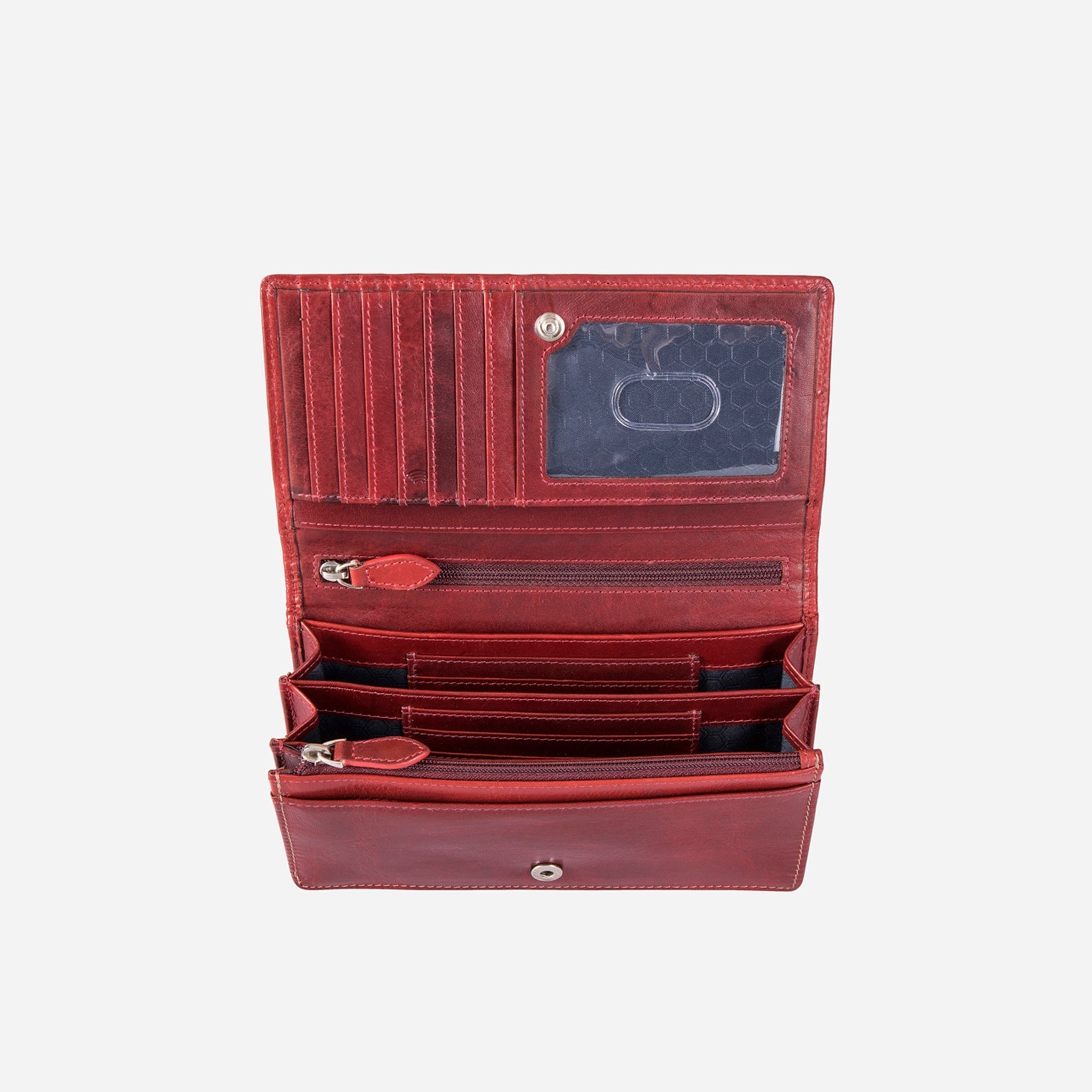 Large rust-colored leather purse with concertina design, showcasing its spacious interior and elegant finish.