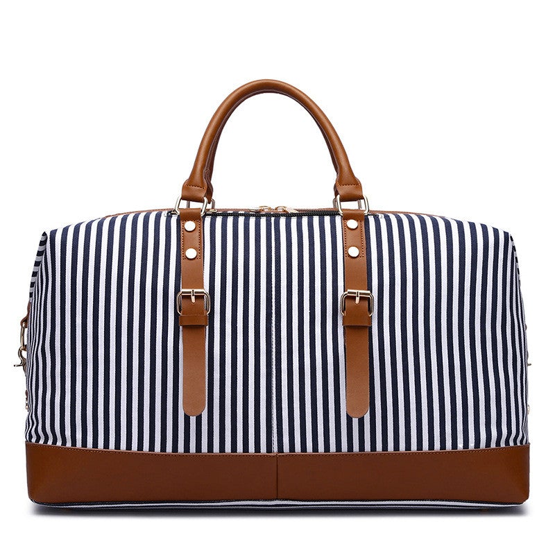 Large Striped Portable Canvas Travel Bag in blue stripes, showcasing its spacious design and durable canvas material.