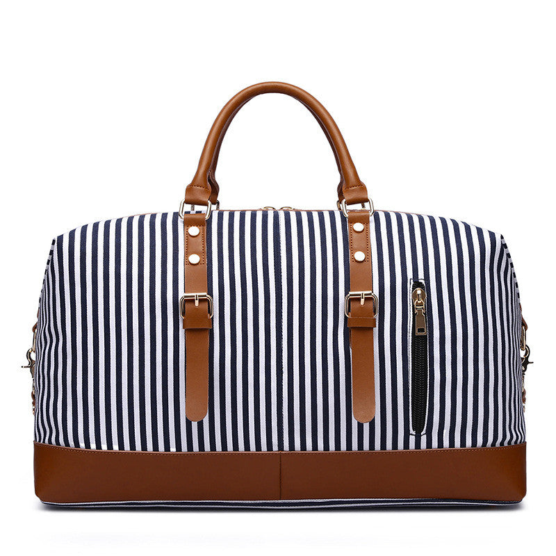 Large Striped Portable Canvas Travel Bag in blue stripes, showcasing its spacious design and durable canvas material.