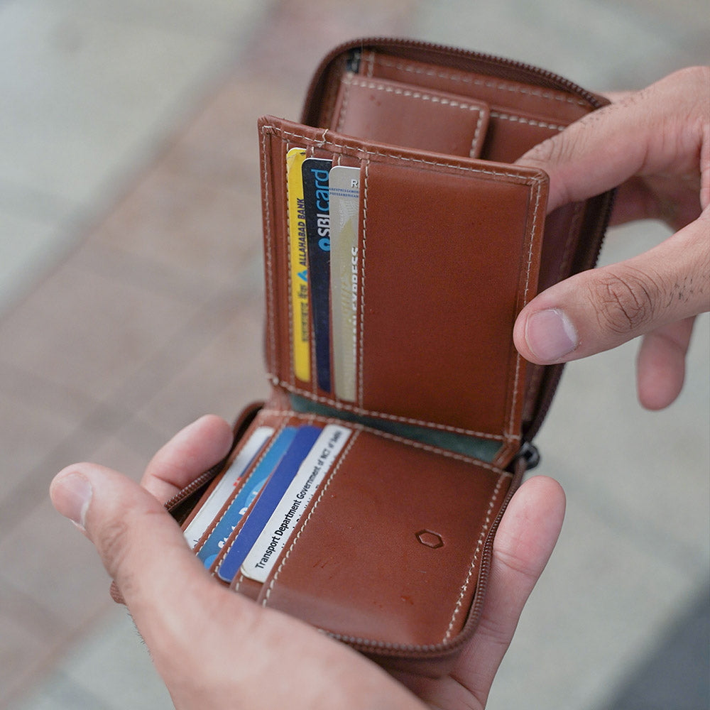 Large zip around wallet in clay color with coin pocket and ID window, designed for men.