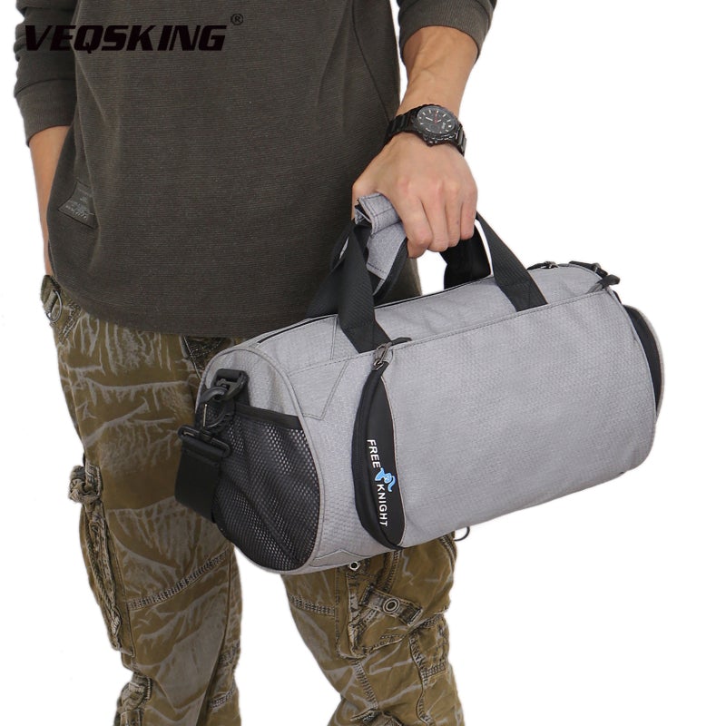 Large-capacity gym bag made of durable nylon, featuring a plain design and spacious interior for gym and travel essentials.