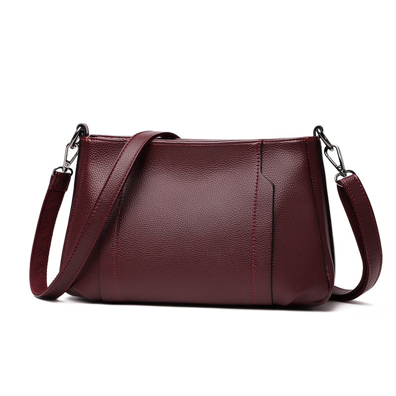 Large-capacity Urban Simplicity Bag for middle-aged women, featuring a stylish PU exterior and double straps.