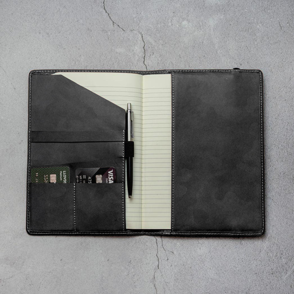 Leather A5 Notebook Cover in Camo with card and pen slots, showcasing its stylish design and functionality.