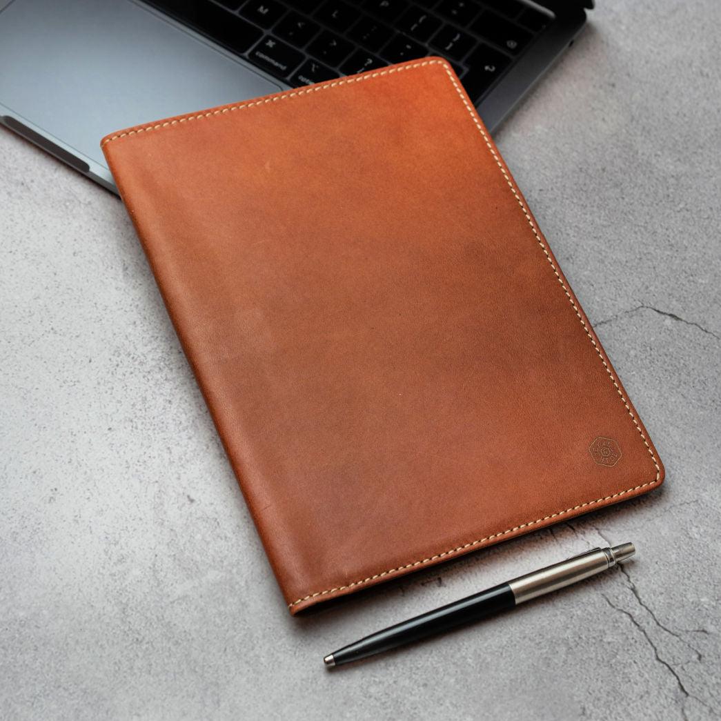 Leather A5 Notebook Cover in Clay color, featuring card slots and a pen holder.