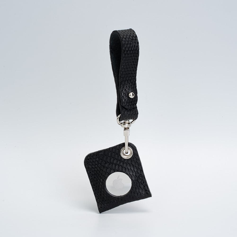 A stylish Leather AirTag bag charm made from premium Italian leather, showcasing its rich texture and customizable features.