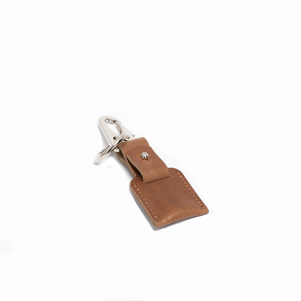 Leather AirTag Keychain 2.0 featuring premium Italian leather, customizable options, and a durable carabiner keyring.