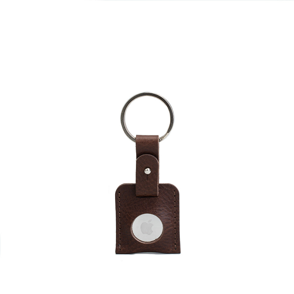 A stylish Leather AirTag Keyring made from premium Italian leather, showcasing its craftsmanship and customizable features.