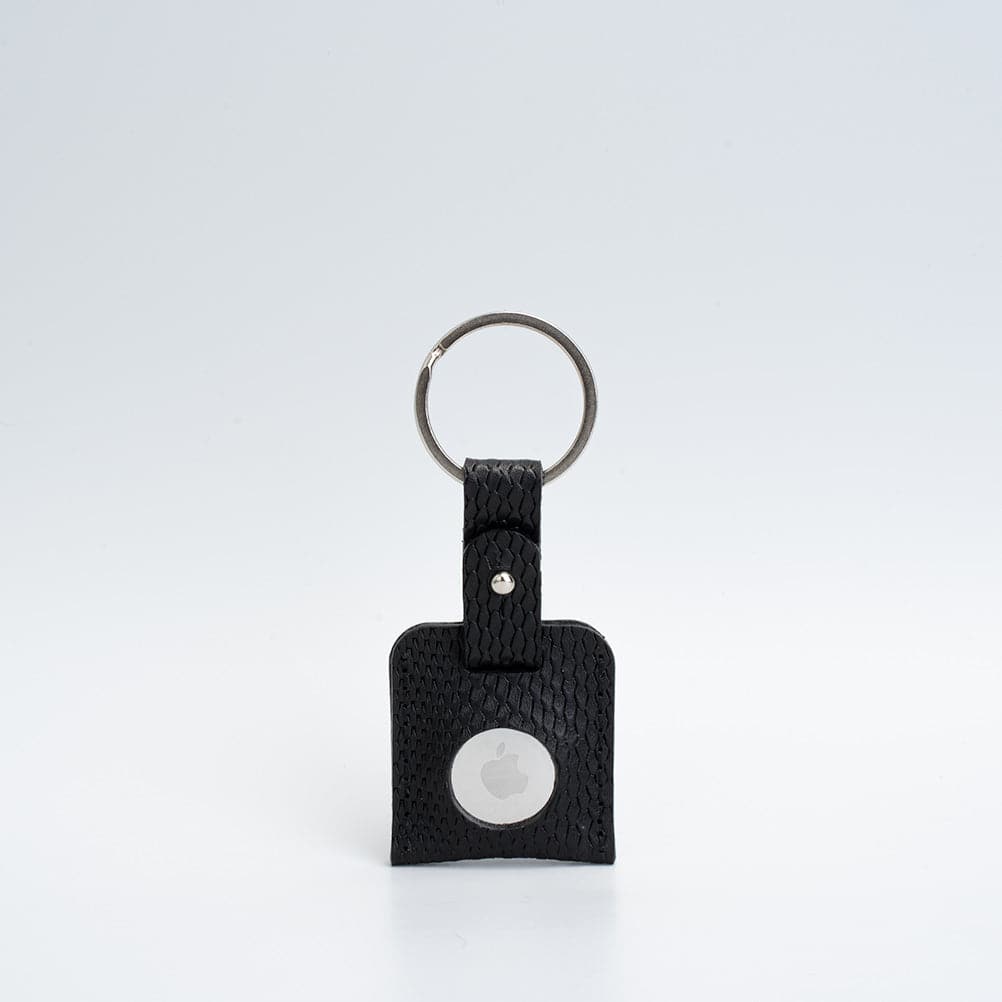 A stylish Leather AirTag Keyring made from premium Italian leather, showcasing its craftsmanship and customizable features.