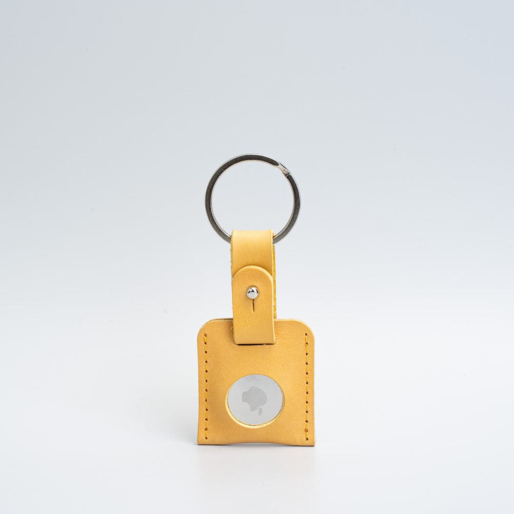 A stylish Leather AirTag Keyring made from premium Italian leather, showcasing its craftsmanship and customizable features.