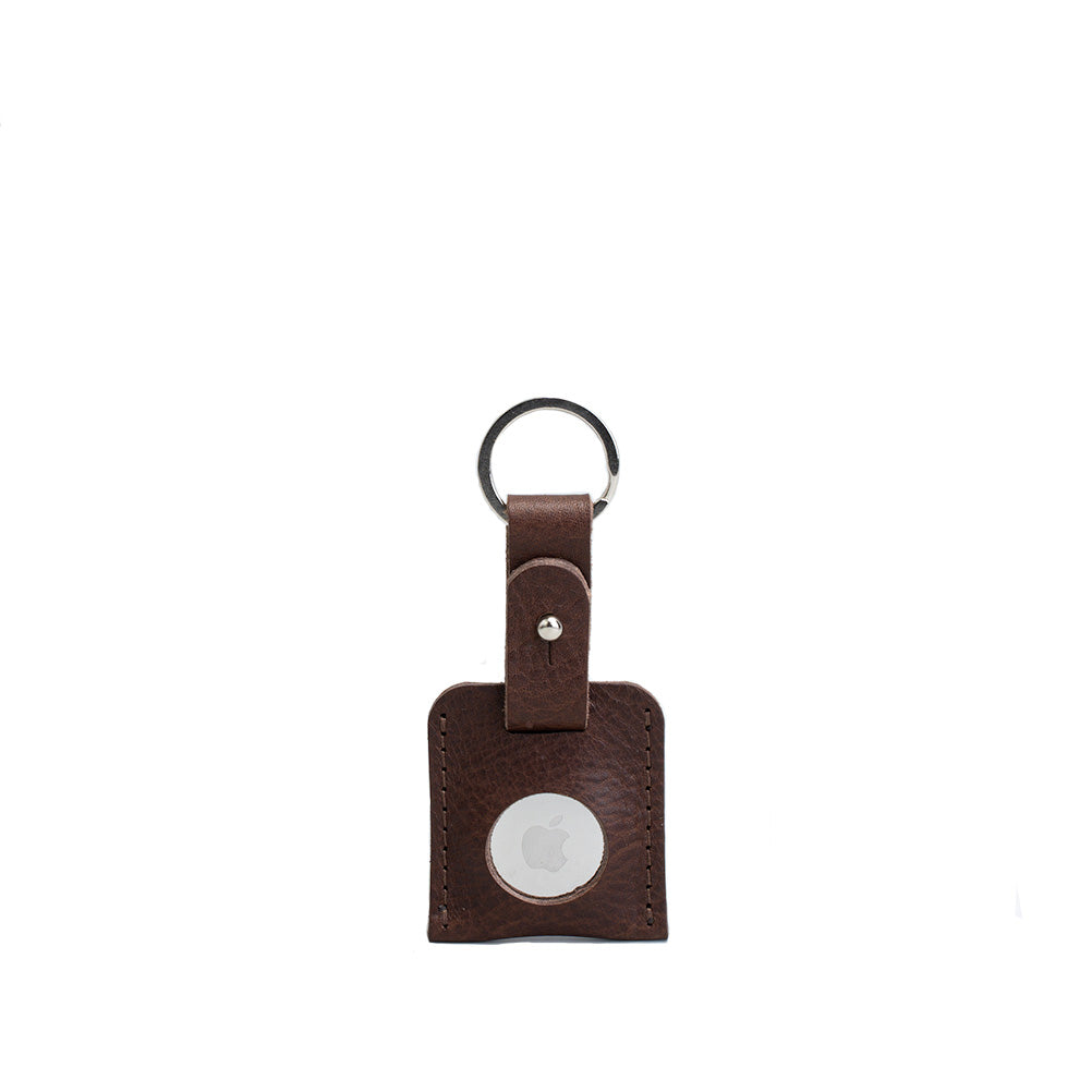 A stylish Leather AirTag Keyring made from premium Italian leather, showcasing its craftsmanship and customizable features.