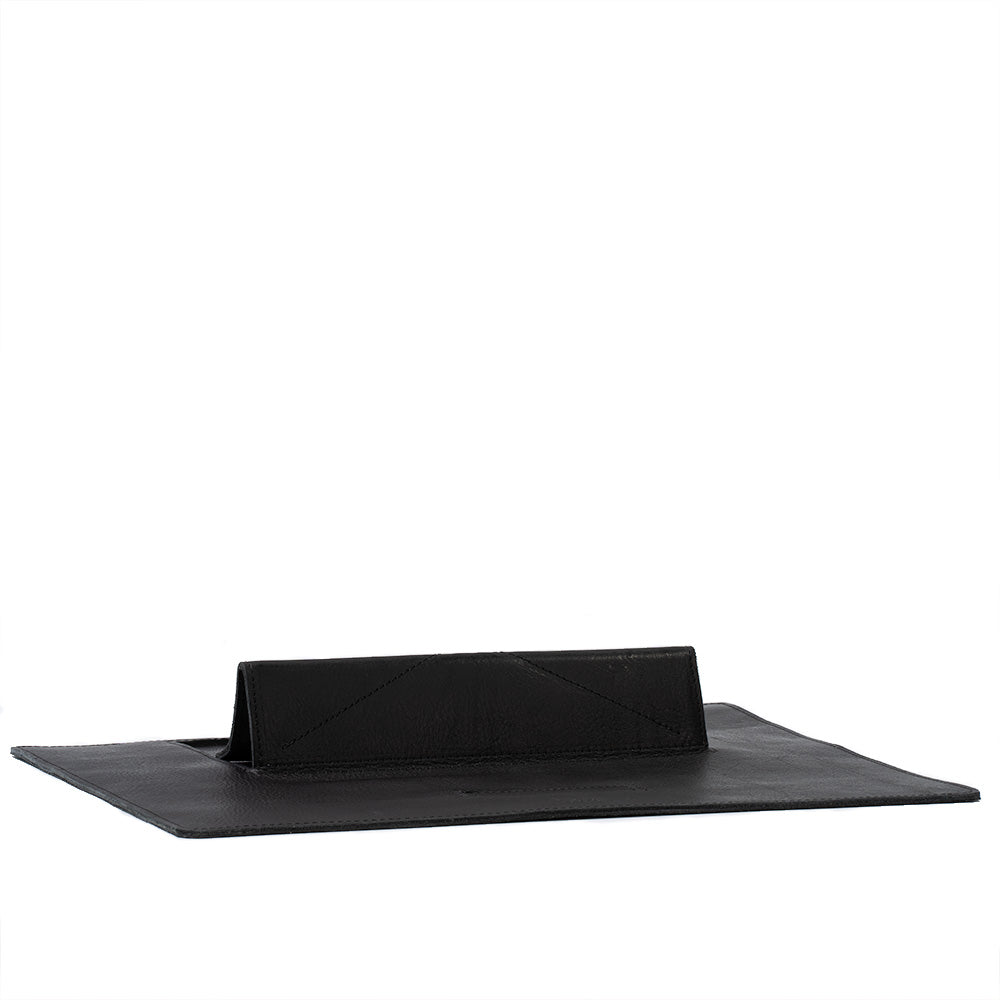 Leather Desktop Mat for iPad showcasing premium Italian leather with a minimalist design, featuring adjustable elevation angles.