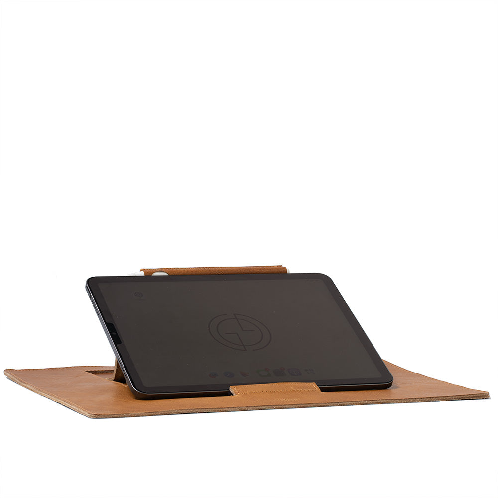 Leather Desktop Mat for iPad showcasing premium Italian leather with a minimalist design, featuring adjustable elevation angles.