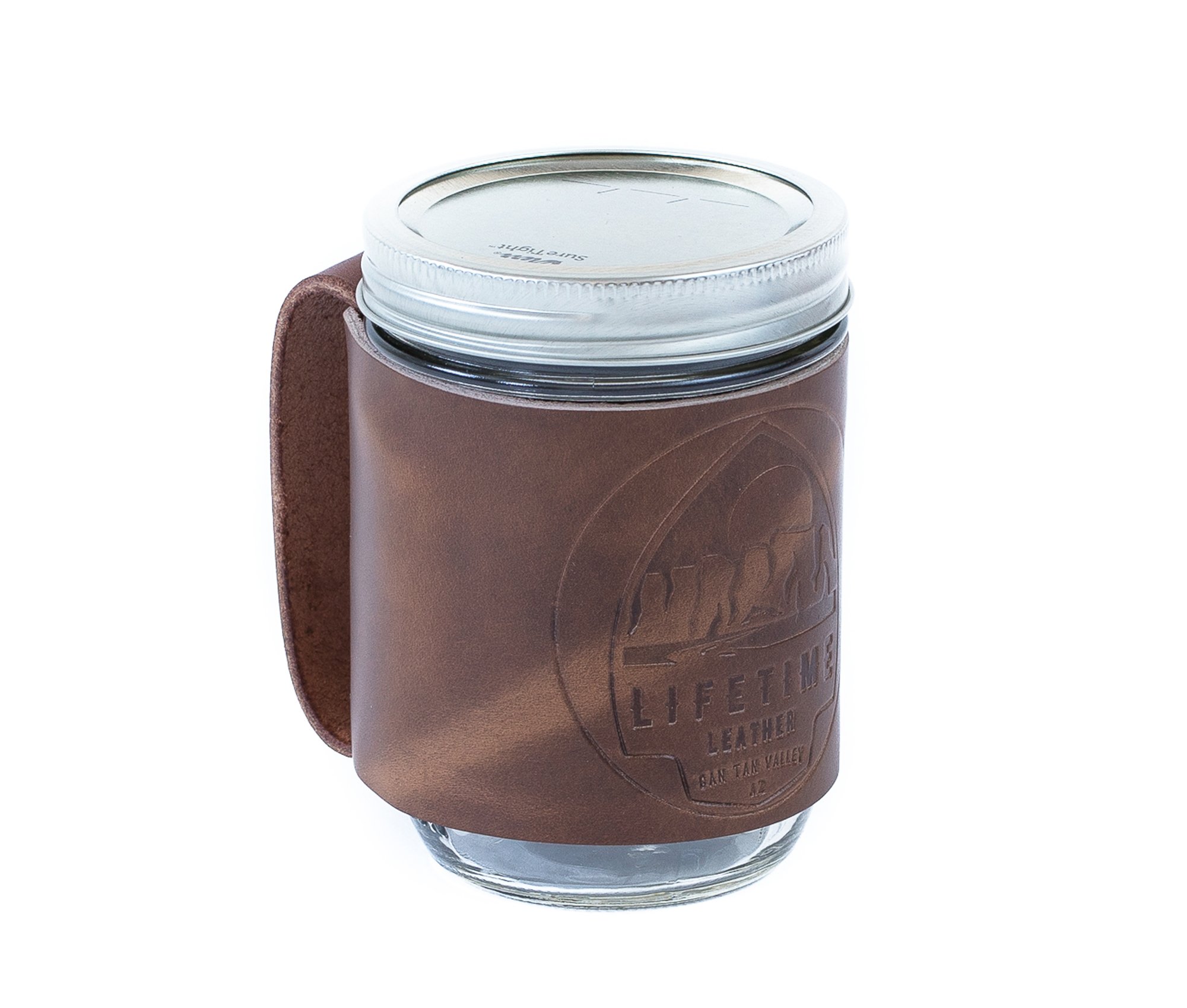 Leather Mason Jar Coozie hugging a Mason jar, showcasing its hand-stitched design and riveted handle.