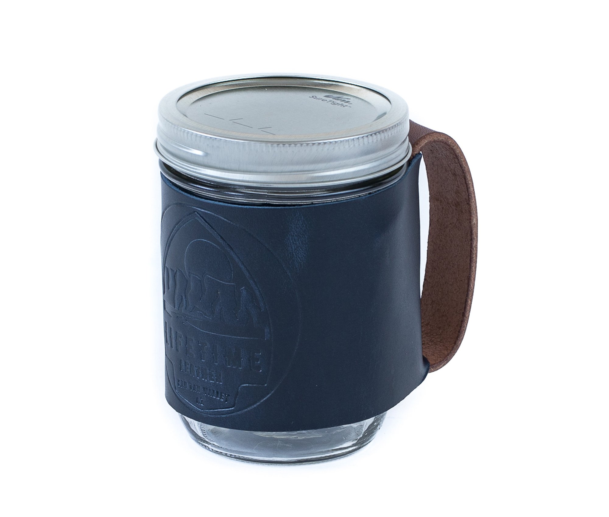 Leather Mason Jar Coozie hugging a Mason jar, showcasing its hand-stitched design and riveted handle.