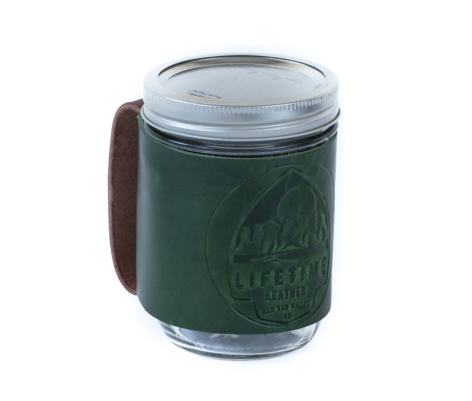 Leather Mason Jar Coozie hugging a Mason jar, showcasing its hand-stitched design and riveted handle.