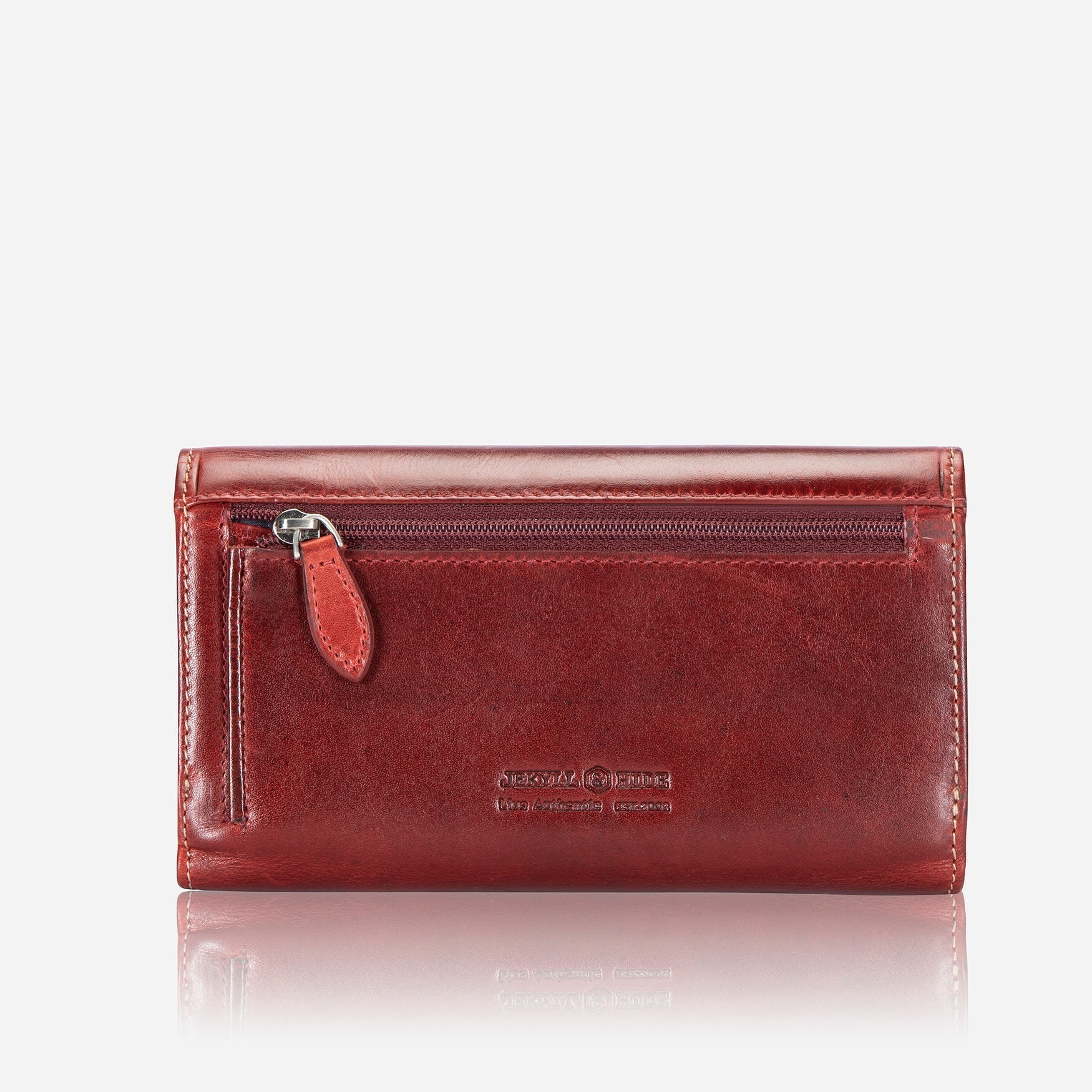 Elegant rust leather purse with double-studded design, showcasing its slim and versatile style.