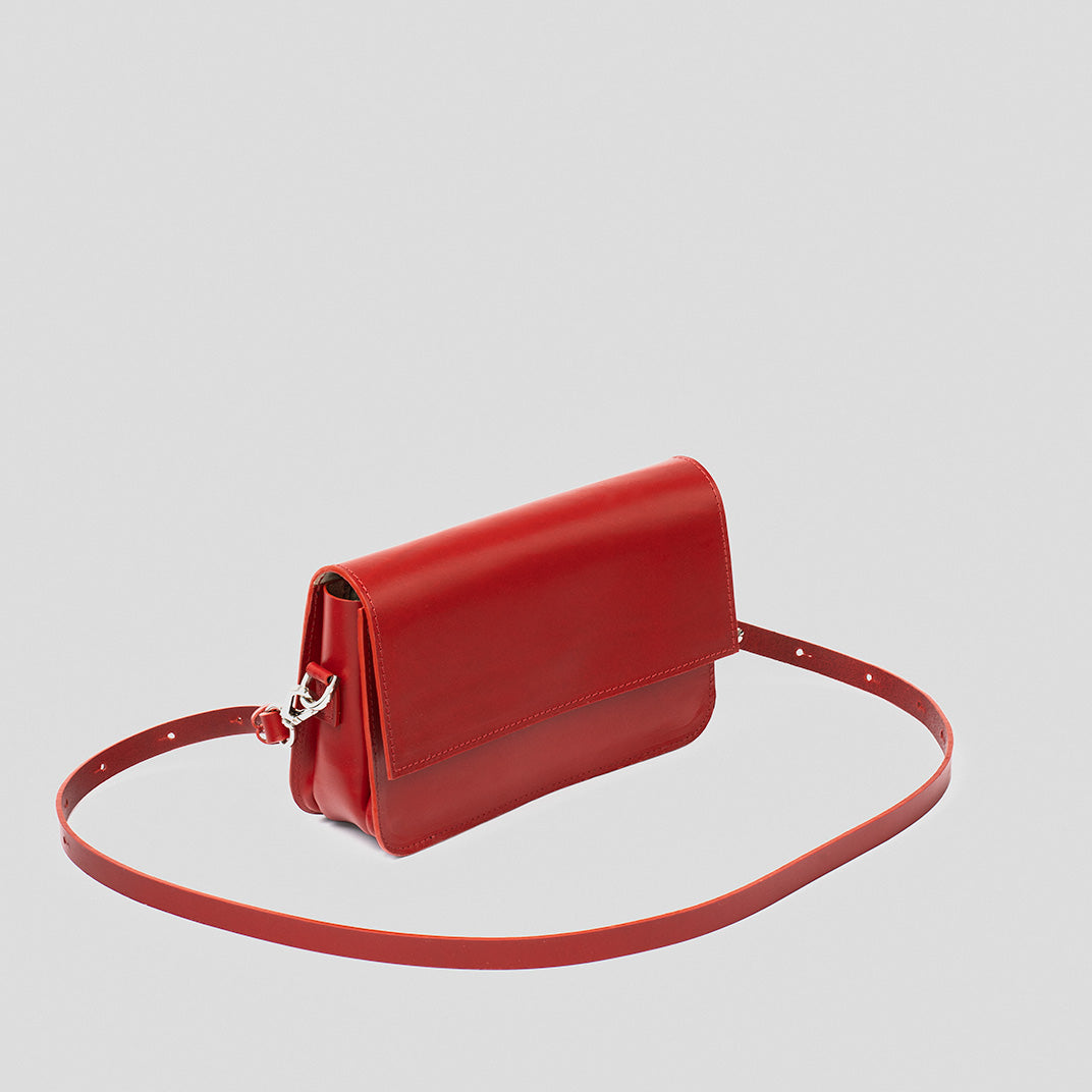 Curie Leather Shoulder Bag in Red, showcasing premium Italian leather, structured design, and adjustable strap.