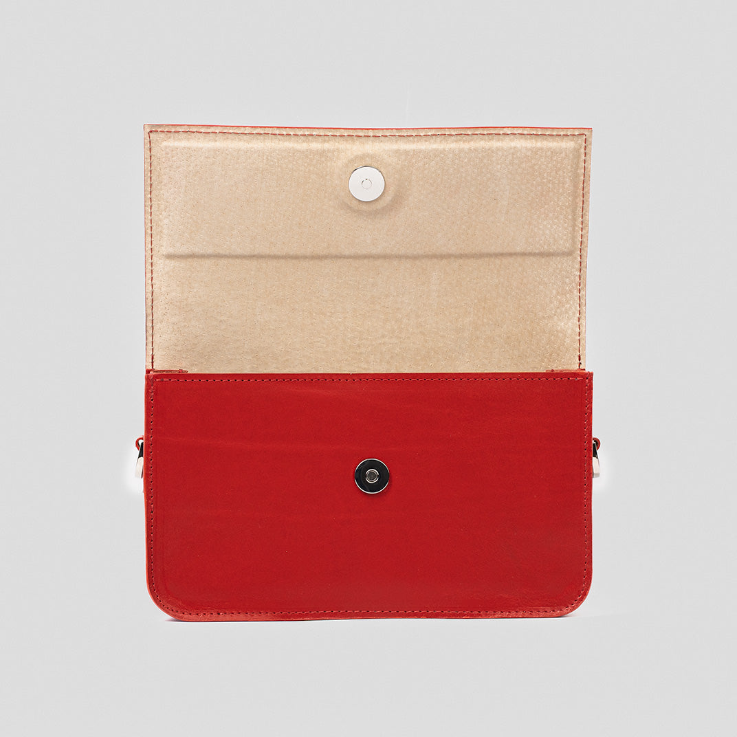 Curie Leather Shoulder Bag in Red, showcasing premium Italian leather, structured design, and adjustable strap.