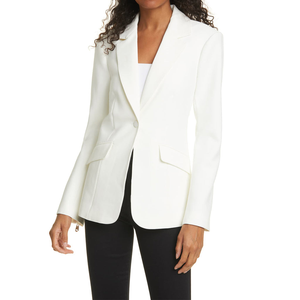 A stylish women's real lambskin leather blazer in black, featuring satin lining and multiple pockets, showcasing high-quality craftsmanship.