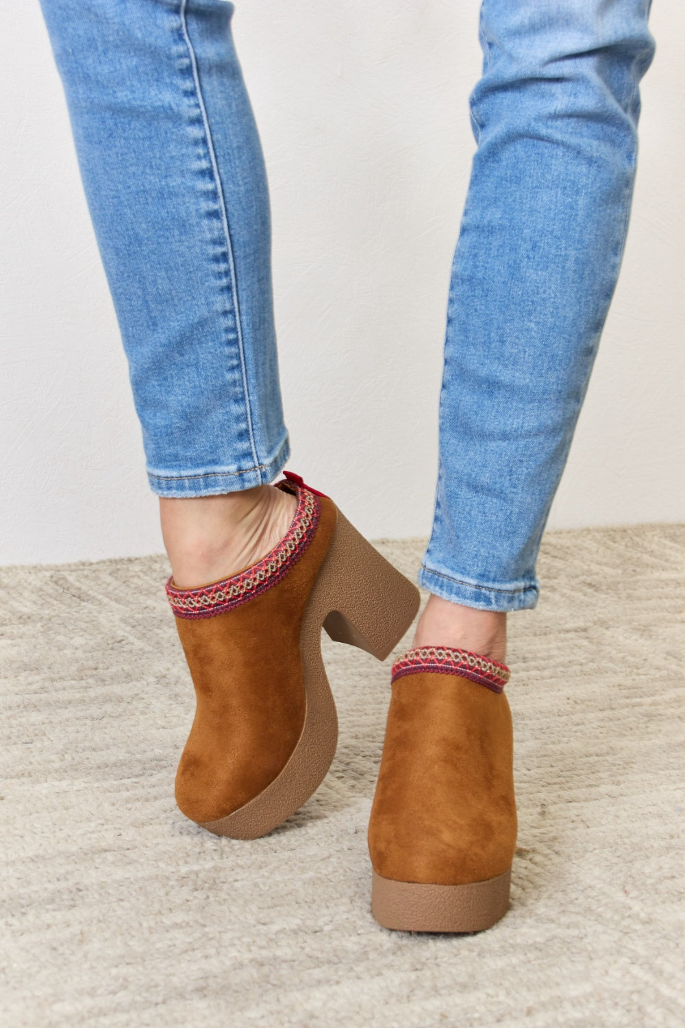 Stylish Legend Footwear Platform Suede Clog Heels with a high heel and soft suede finish, perfect for fashion-forward outfits.