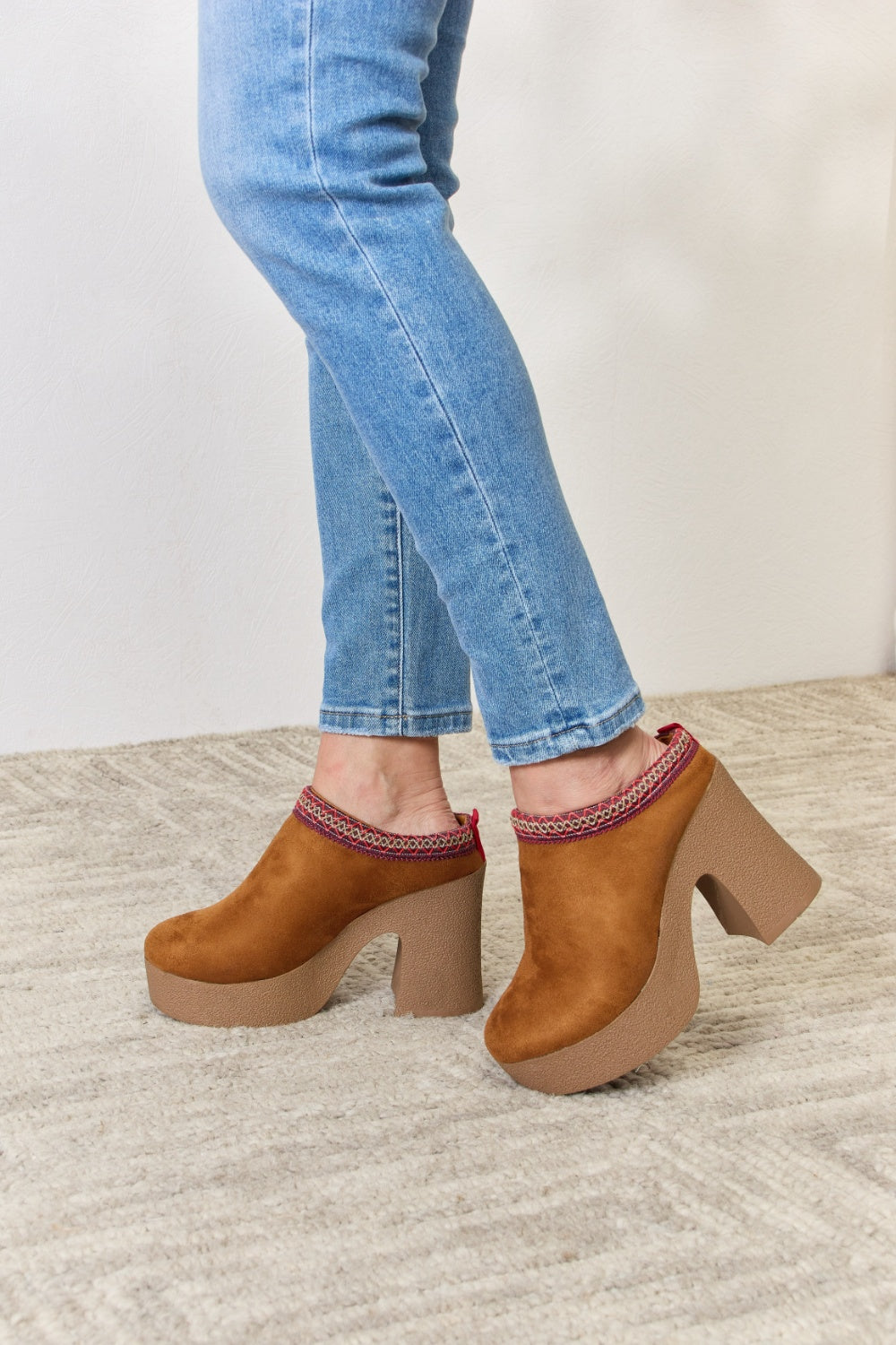 Stylish Legend Footwear Platform Suede Clog Heels with a high heel and soft suede finish, perfect for fashion-forward outfits.