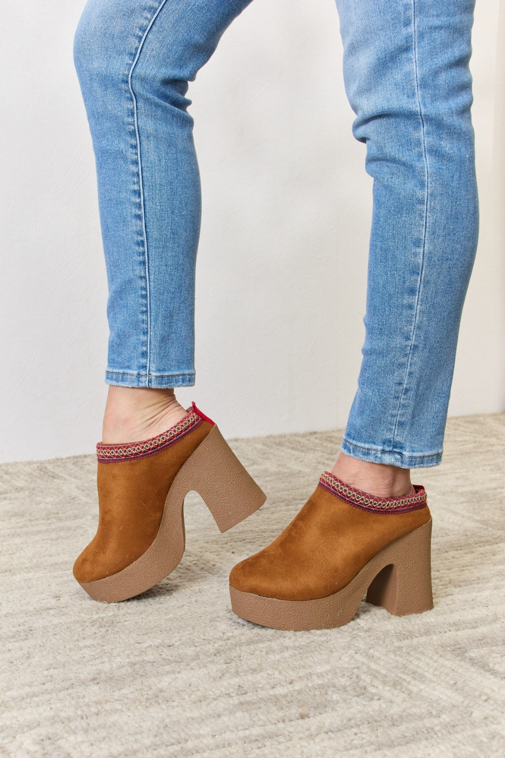 Stylish Legend Footwear Platform Suede Clog Heels with a high heel and soft suede finish, perfect for fashion-forward outfits.