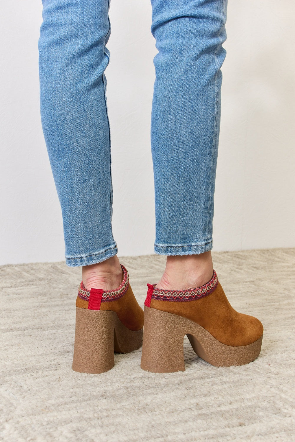 Stylish Legend Footwear Platform Suede Clog Heels with a high heel and soft suede finish, perfect for fashion-forward outfits.