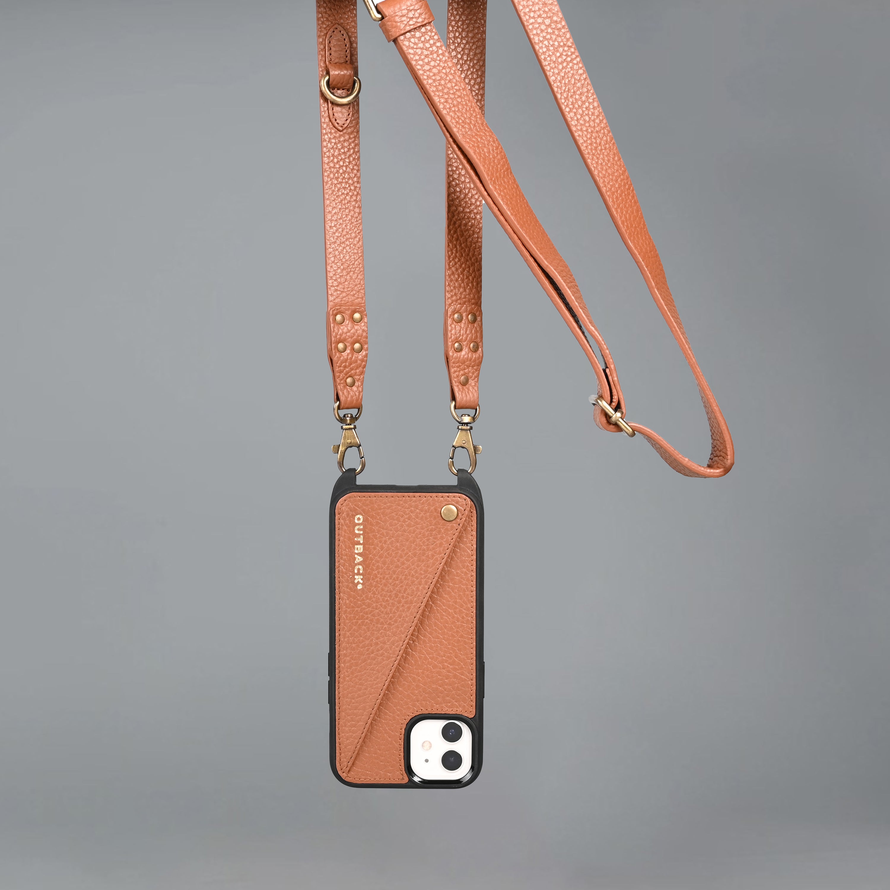 Lifestyle iPhone Case made from full grain leather with adjustable crossbody strap and external pocket for cash and cards.