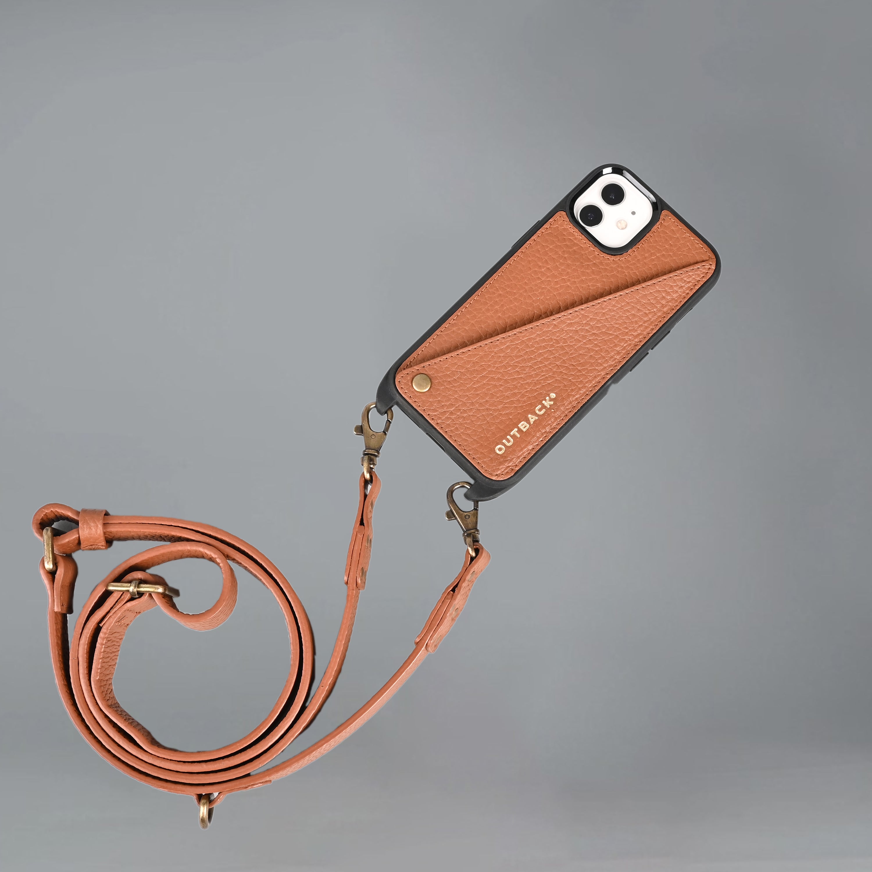 Lifestyle iPhone Case made from full grain leather with adjustable crossbody strap and external pocket for cash and cards.