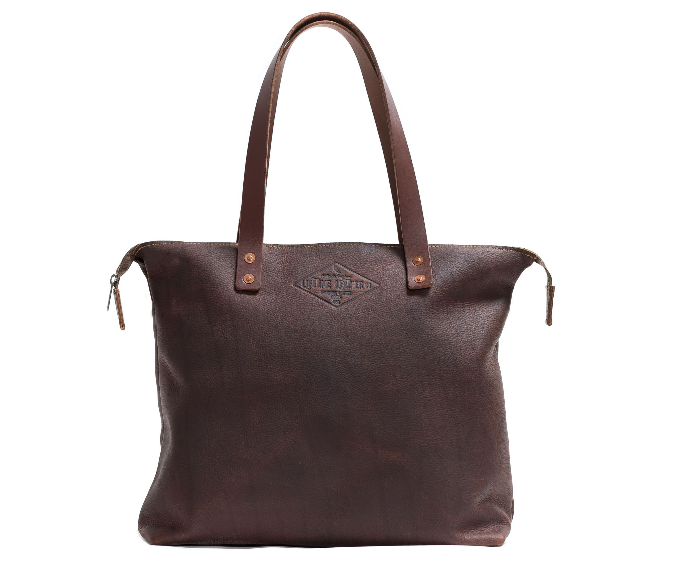 Lifetime Tote - Pebble, a minimalist leather tote bag in full grain leather, featuring a spacious interior and stylish design.