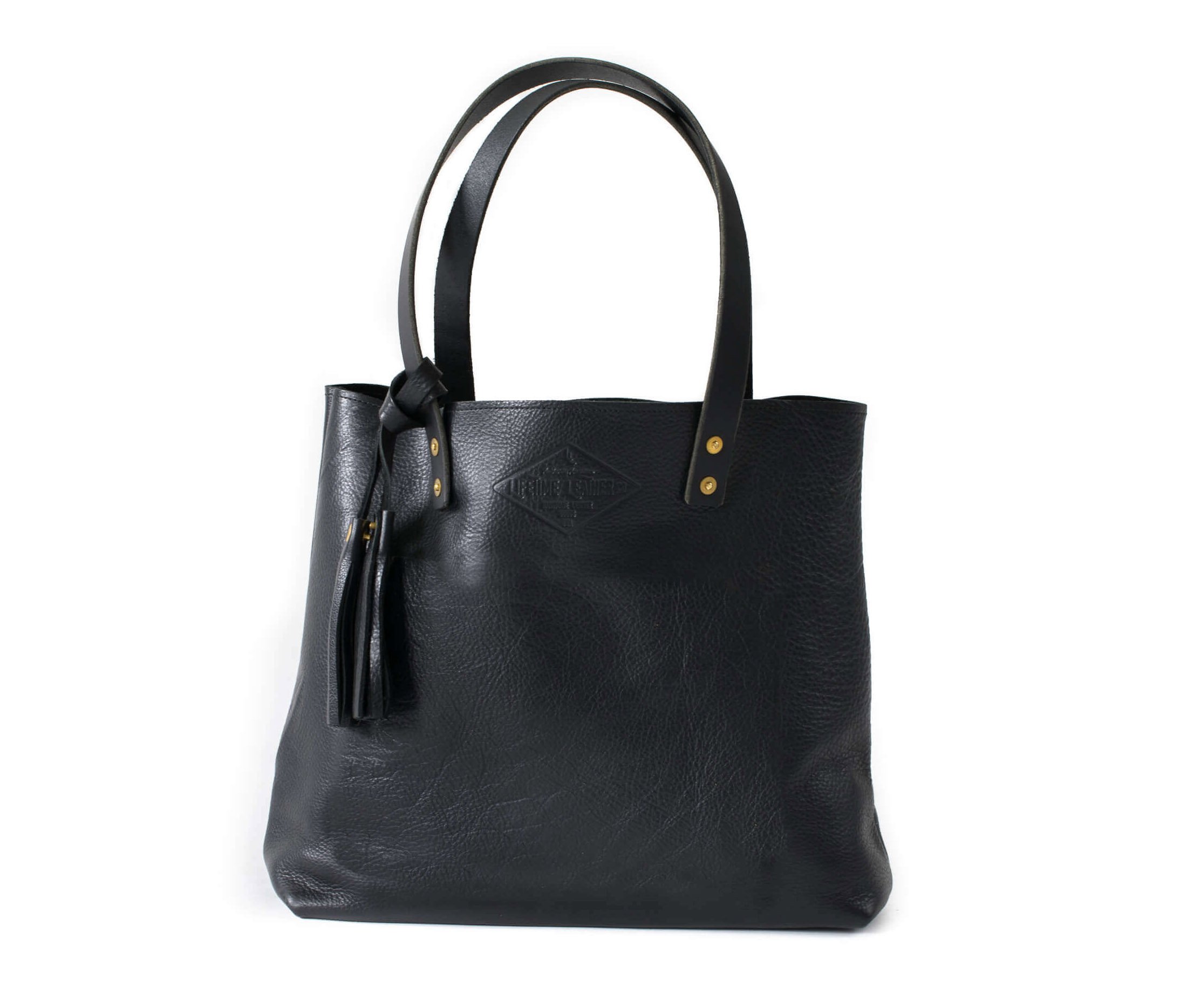 Lifetime Tote - Pebble, a minimalist leather tote bag in full grain leather, featuring a spacious interior and stylish design.