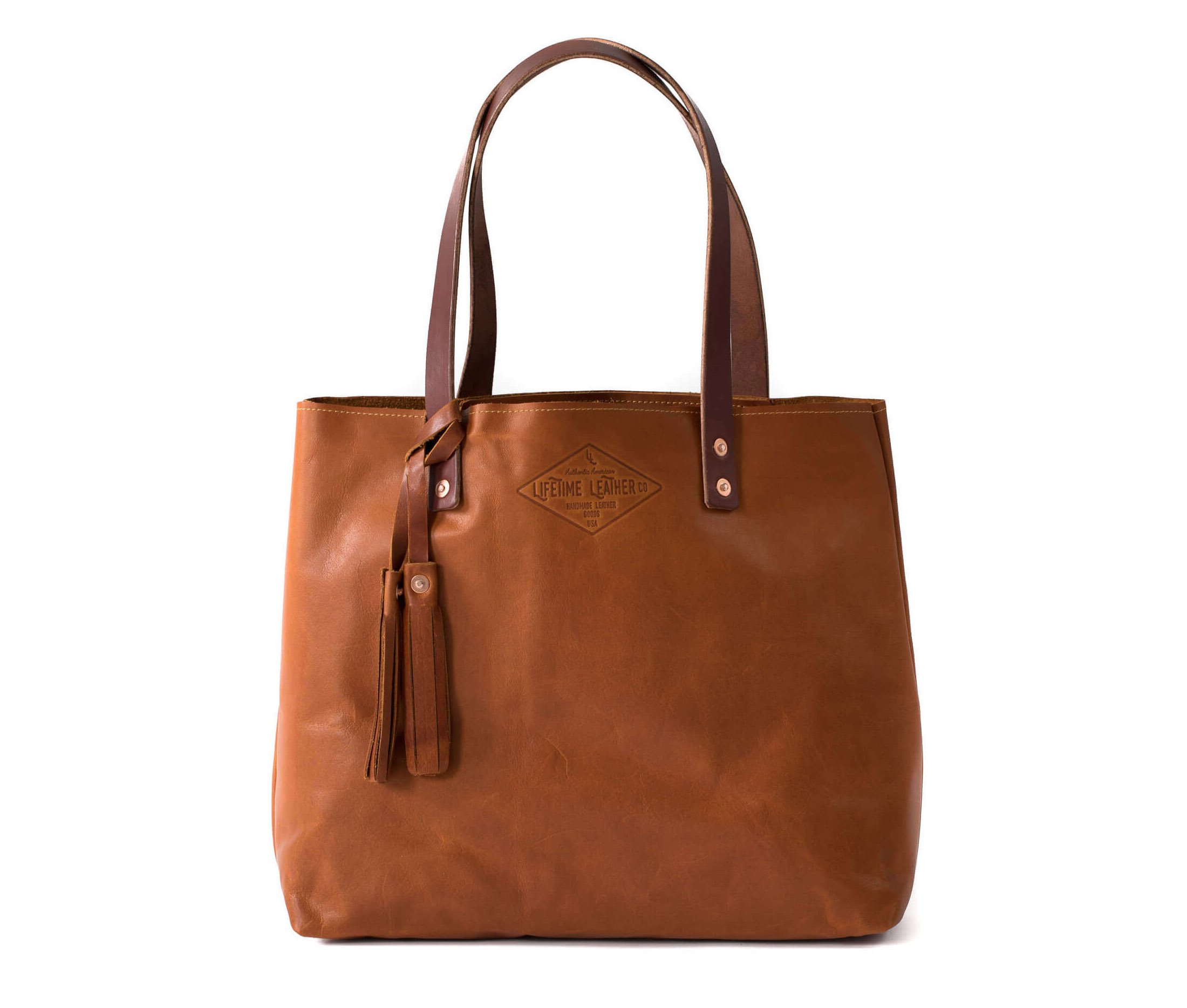 Lifetime Tote - Pebble, a minimalist leather tote bag in full grain leather, featuring a spacious interior and stylish design.