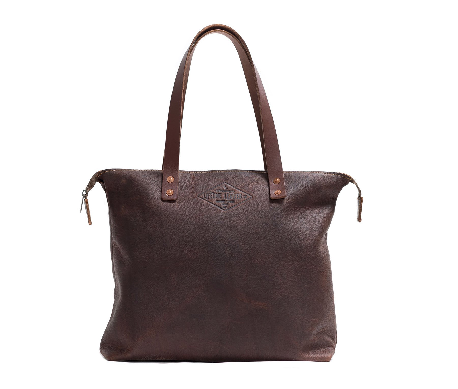 Lifetime Zippered Tote in Pebble leather, featuring a zippered top, front pocket, and interior organization pockets.