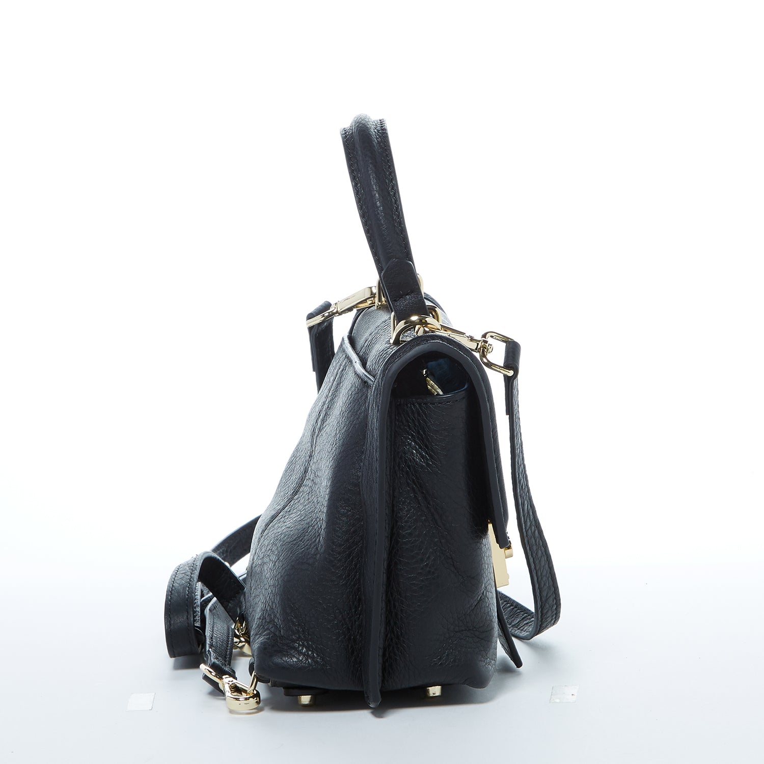 Linda Black Crossbody Backpack Purse made of soft Italian pebble leather with gold hardware, showcasing its stylish design and versatility.