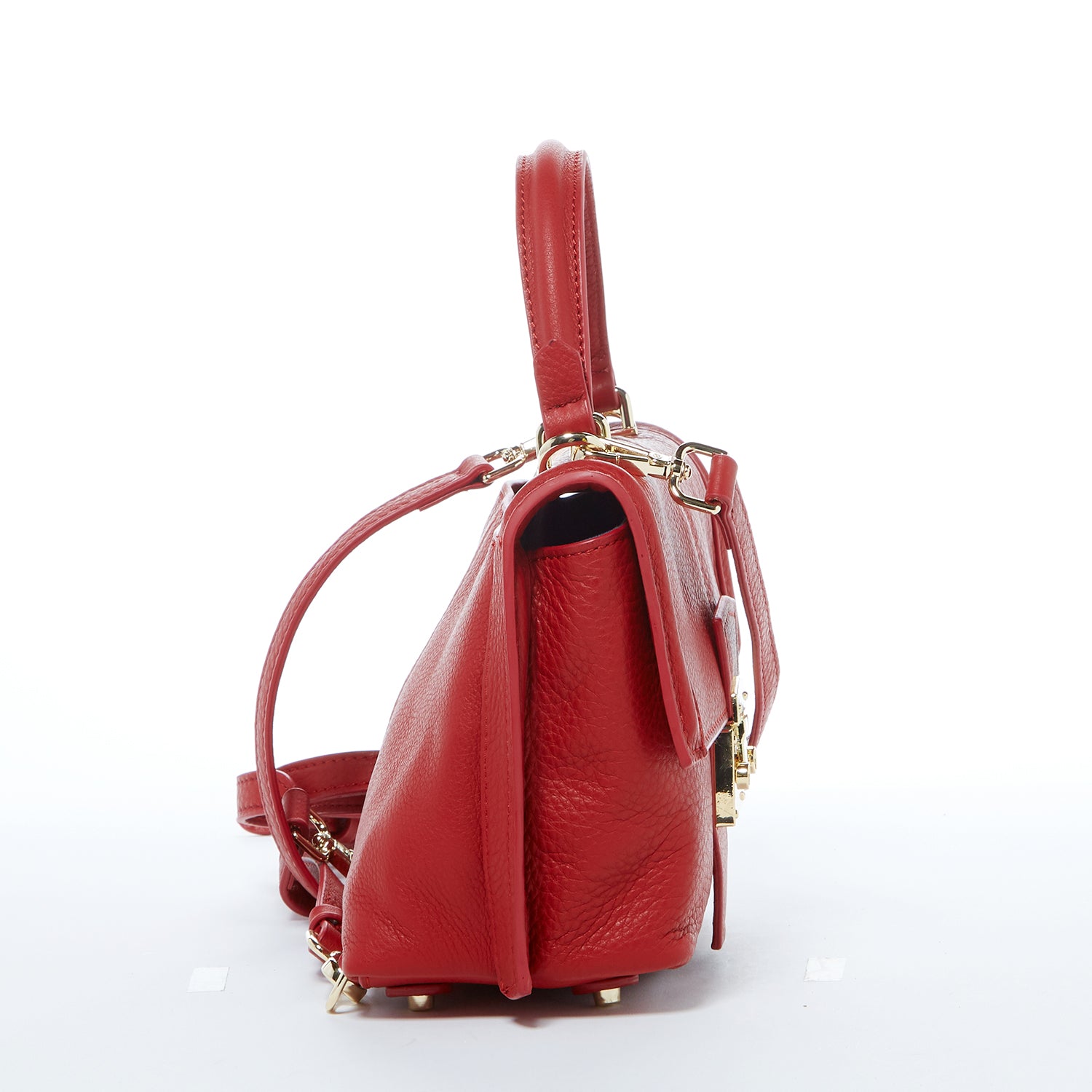 Side view of red handbag.