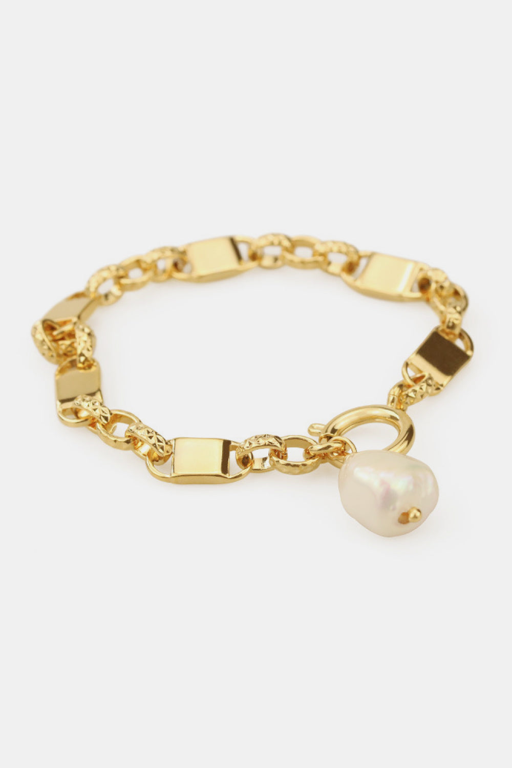 A stylish Link Chain Bracelet featuring a chunky gold plated brass chain and a delicate pearl pendant, perfect for elegant accessorizing.