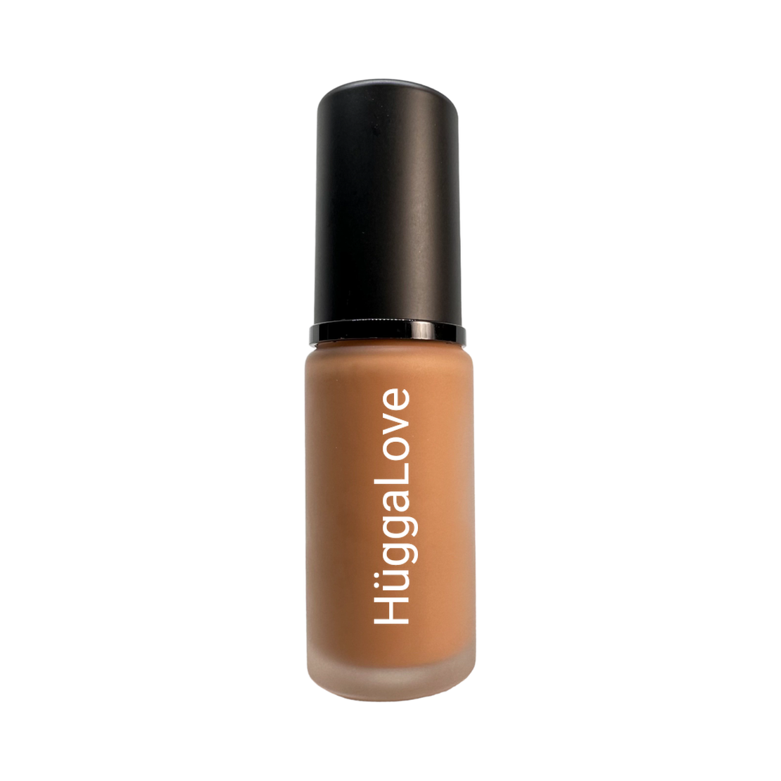 A bottle of Tahini Liquid Foundation showcasing its sleek design and rich color, perfect for achieving a flawless complexion.