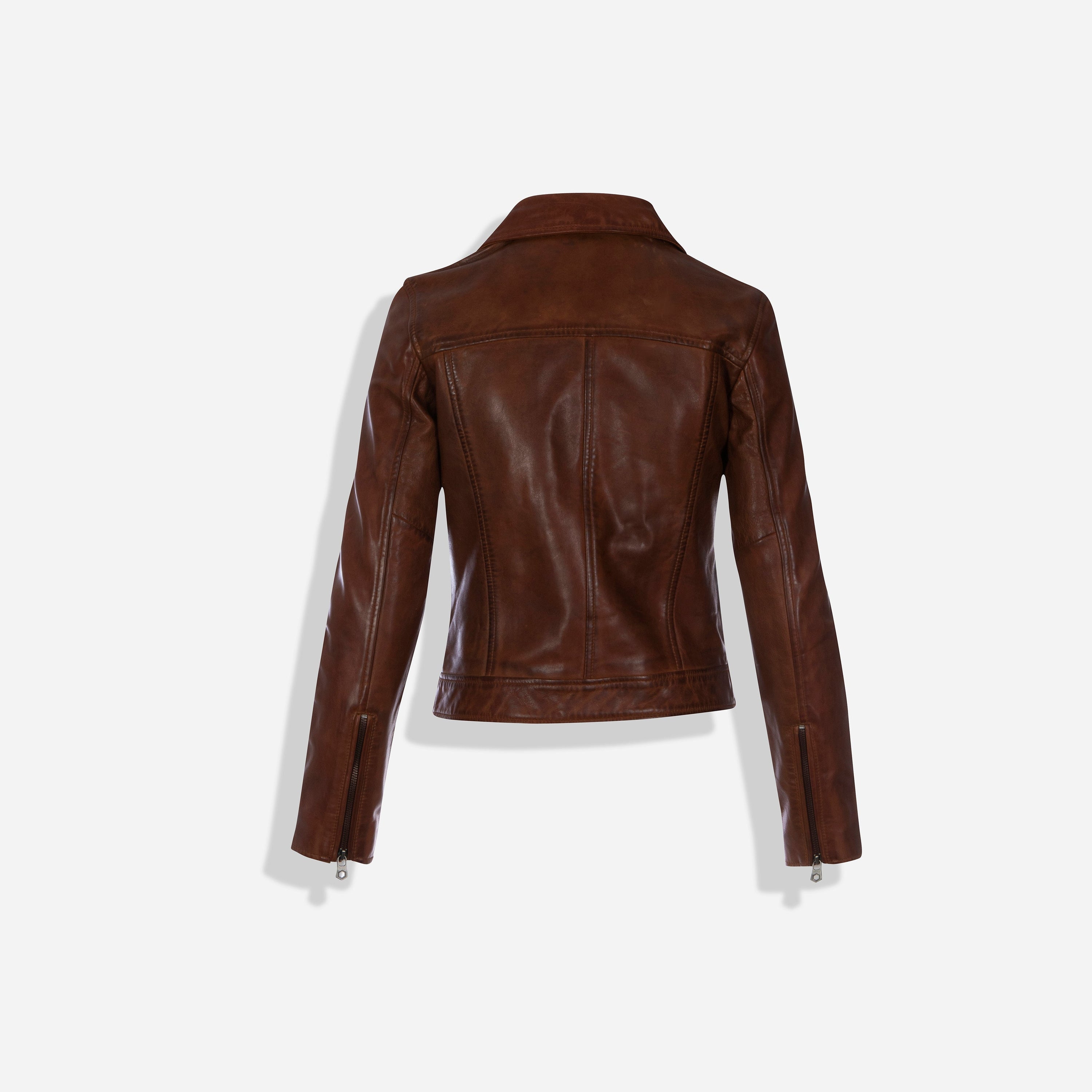 Lisa Bomber Jacket in Cognac featuring a detachable sheep fur collar and multiple pockets, showcasing a stylish and practical design.