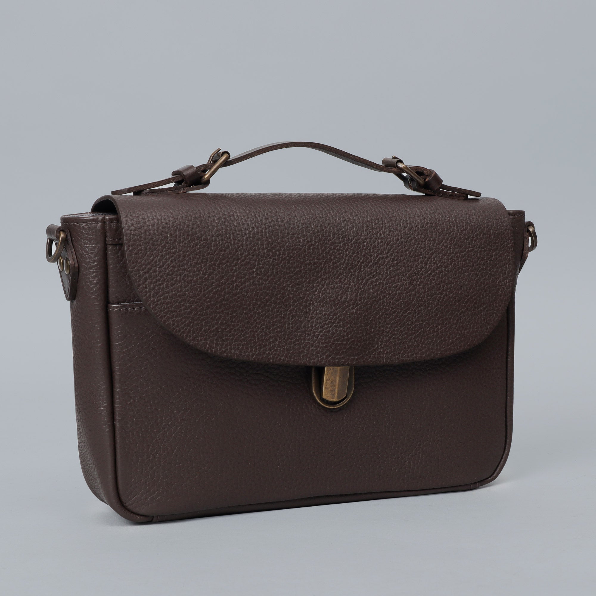 London Crossbody Bag made from premium full grain leather with vintage lock and multiple compartments.